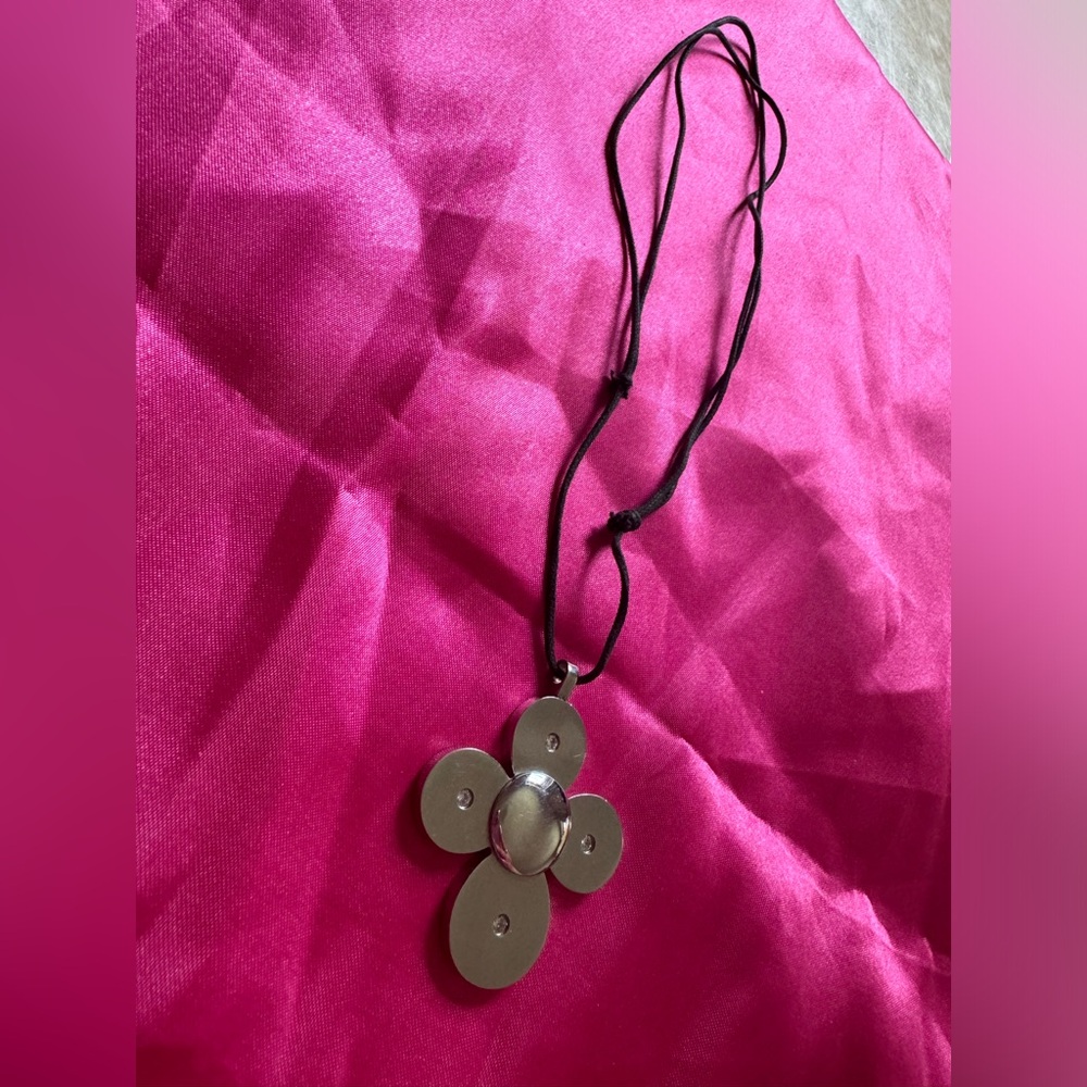 Stainless Steel Flower Charm on rope necklace UNISEX